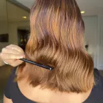 Foto di donna con capelli medi ramato chiaro