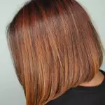 Foto di donna con capelli medi ramato medio